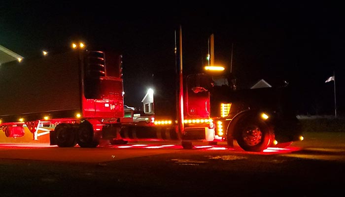 Peterbilt semi truck tractor trailer with reefer as part of JDK Logistics nationwide freight transportation broker fleet